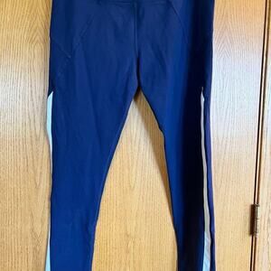 Fornia leggings, navy color white stripe on side of legs,  women’s size L